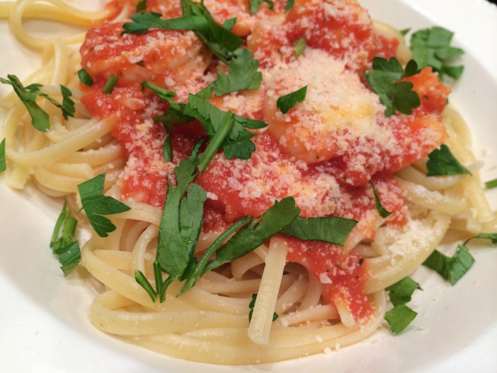 Shrimp Scampi with tomatoes over linguine Shrimp Scampi with tomatoes over linguine